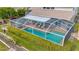 Enjoy a private screened pool with a covered lanai, perfect for relaxing and entertaining at 6208 Forrestal Dr, Tampa, FL 33625