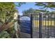 Community dog park entrance with posted rules for pet owners and enclosed space for recreation at 624 Maraviya Blvd, Nokomis, FL 34275