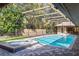 Screened in pool and patio, with jacuzzi at 70 Deerpath Dr, Oldsmar, FL 34677