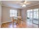 Breakfast nook featuring a ceiling fan and a sliding glass door to the lanai at 709 Lanewood Dr, Seffner, FL 33584