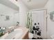 Cheerful bathroom with a panda-themed shower curtain and decor at 10944 Keys Gate Dr, Riverview, FL 33579
