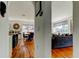 Open-concept view of the living and dining area with hardwood floors at 1208 E Giddens Ave, Tampa, FL 33603