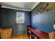 Mud room features a wooden bench and storage near the entry at 1208 E Giddens Ave, Tampa, FL 33603
