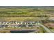 Community aerial view featuring residences, landscaping, and a pond nearby at 12630 Aston Dr, Hudson, FL 34669