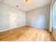 Comfortable bedroom with light walls, hardwood floors, and ample natural light at 1312 E 19Th Ave, Tampa, FL 33605