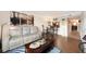 Comfortable living room with a bar-height table and view of kitchen at 13733 Juniper Blossom Dr, Tampa, FL 33618