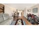 Open-concept living room with view to kitchen and patio at 13733 Juniper Blossom Dr, Tampa, FL 33618