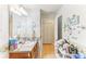 Bright bathroom with good lighting, a vanity, and tile flooring at 15519 Lily Wood Ln, Brooksville, FL 34604