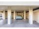 Covered parking area showcasing designated parking spaces and storage units within the condominium complex at 1651 Sand Key Estates Ct # 78, Clearwater, FL 33767