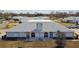 Overhead view of a charming home and its surroundings, showcasing the community layout and design at 23227 Club Villas Dr # 38, Land O Lakes, FL 34639