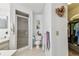 Neat bathroom featuring a glass-enclosed shower and a charming floral decoration, combining function and style at 23227 Club Villas Dr # 38, Land O Lakes, FL 34639