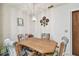 Cozy dining area with overhead lighting and decorative wall plates at 23227 Club Villas Dr # 38, Land O Lakes, FL 34639