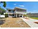 Unique waterfront home with ample outdoor space, covered parking, and a fenced yard at 23227 Club Villas Dr # 38, Land O Lakes, FL 34639