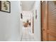 Hallway leading to living area with tile floors and closet at 23227 Club Villas Dr # 38, Land O Lakes, FL 34639