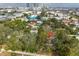 Aerial view of the property near the city, surrounded by lush trees in an urban community at 235 16Th Se Ave, St Petersburg, FL 33701