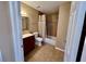 A bathroom with a single vanity sink and a shower and tub combination at 2400 Feather Sound Dr # 1016, Clearwater, FL 33762