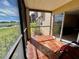 Enclosed porch with tile flooring offering scenic views at 2400 Feather Sound Dr # 1016, Clearwater, FL 33762
