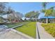 Well-maintained bocce ball court surrounded by landscaping and seating, perfect for friendly competition and outdoor fun at 320 Seneca Falls Dr, Apollo Beach, FL 33572
