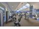 Well-equipped gym with modern fitness machines and natural light, promoting a healthy and active lifestyle at 320 Seneca Falls Dr, Apollo Beach, FL 33572