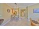 Open concept kitchen bar with granite counters and bar seating at 320 Seneca Falls Dr, Apollo Beach, FL 33572
