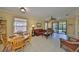 Open-concept living room and dining area with natural light at 320 Seneca Falls Dr, Apollo Beach, FL 33572
