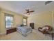 Serene main bedroom with calm paint color and ceiling fan at 320 Seneca Falls Dr, Apollo Beach, FL 33572