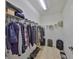 Walk-in closet with lots of storage, shelving, and room for shoes and luggage at 320 Seneca Falls Dr, Apollo Beach, FL 33572