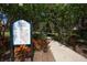 Well-maintained community walking trail with lush landscaping and beautiful surrounding trees at 320 Seneca Falls Dr, Apollo Beach, FL 33572