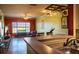 Comfortable living room with overhead fan, window bench, and view from kitchen at 4323 Bayside Village Dr # 314, Tampa, FL 33615