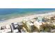 An aerial view of a beachfront condo, highlighting its prime location and ocean views at 74 Gulf Blvd # 1B, Indian Rocks Beach, FL 33785