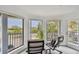 Private balcony with comfortable seating and views of the neighborhood at 74 Gulf Blvd # 1B, Indian Rocks Beach, FL 33785