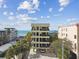 Desirable condo building featuring balconies overlooking the ocean, offering serene coastal living at 74 Gulf Blvd # 1B, Indian Rocks Beach, FL 33785
