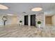 Spacious lobby featuring marble walls, tile floors, elevators, and contemporary decor at 7600 Bayshore Dr # 204, Treasure Island, FL 33706