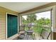 Enjoy the outdoors from this screened balcony overlooking the lush landscaping and community pool at 8926 Manor Loop # 207, Lakewood Ranch, FL 34202