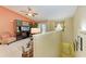 Cozy living room with stairway access to the upper floor at 8926 Manor Loop # 207, Lakewood Ranch, FL 34202