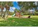 Fun playground area with slides, swings, and climbing structures for enjoyment at 8926 Manor Loop # 207, Lakewood Ranch, FL 34202