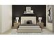 Comfortable bedroom featuring a stylish bed, black and white decor, and modern nightstands at 9705 Runaway Breeze Dr, Land O Lakes, FL 34637