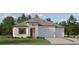 Charming single-story home with a two-car garage, lush lawn, and manicured landscaping offers great curb appeal at 9705 Runaway Breeze Dr, Land O Lakes, FL 34637