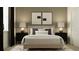 A serene main bedroom with stylish decor and a comfortable bed in a room with modern lighting fixtures at 9705 Runaway Breeze Dr, Land O Lakes, FL 34637