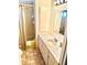 Well-maintained bathroom featuring a tub and shower combination, vanity with storage, and classic finishes at 9790 66Th N St # 206, Pinellas Park, FL 33782