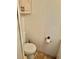Practical half-bathroom featuring a toilet and small sink, ideal for guests at 9790 66Th N St # 206, Pinellas Park, FL 33782