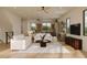 Airy living room with modern furnishings, recessed lighting and large windows providing ample natural light at 1 Aqua Reserve Blvd, New Port Richey, FL 34652