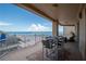 Spacious balcony with seating and dining, perfect for enjoying the Gulf views at 10 Papaya St # 1404, Clearwater Beach, FL 33767