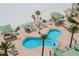 Beautiful pool area surrounded by lounge chairs and palm trees at 10 Papaya St # 1404, Clearwater Beach, FL 33767