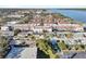 Panoramic aerial view of a waterfront community featuring well-maintained buildings and lush landscaping at 10540 77Th Ter # 209, Seminole, FL 33772