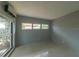 Cozy bedroom with modern AC unit and ample natural light at 10828 99Th Pl, Seminole, FL 33772