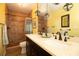 Beautifully tiled bathroom featuring a double vanity and walk-in shower at 112 Forest Cir, Safety Harbor, FL 34695