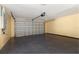 Spacious garage with epoxy flooring, offering ample parking and storage space at 112 Forest Cir, Safety Harbor, FL 34695