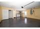 Clean, spacious garage with epoxy flooring, offering ample parking and storage space at 112 Forest Cir, Safety Harbor, FL 34695