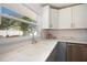 Kitchen sink with a window view with lots of natural light and white countertops at 112 Forest Cir, Safety Harbor, FL 34695